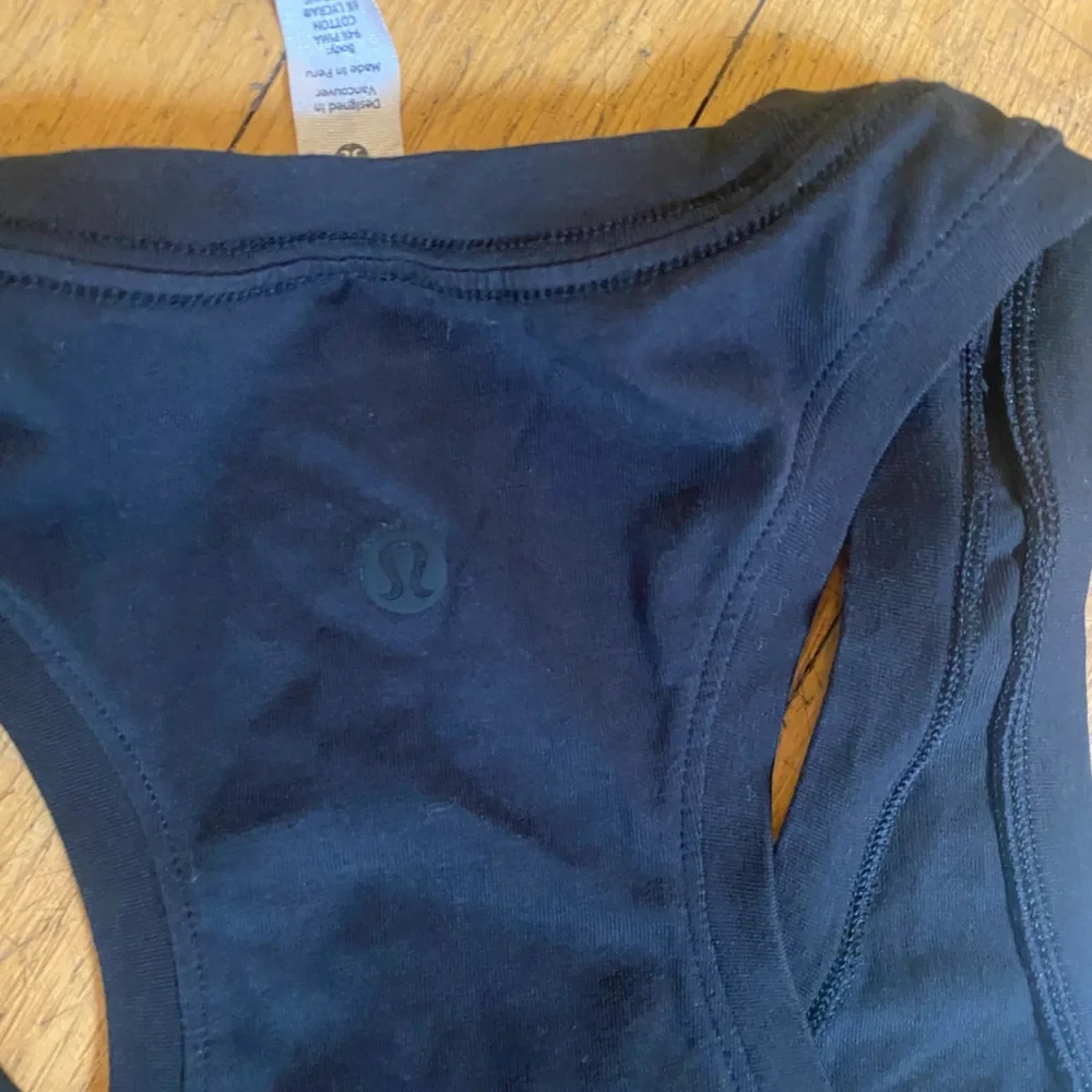 Lulu lemon black racer back tank top. Size 2. Amazing condition!! - Picture 3 of 4